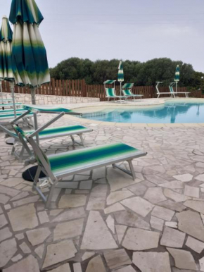 agriturismo gli olivastri -appartamento bel vedere con piscina ,solarium e vista mare,climatizzatore ,wifi Aglientu